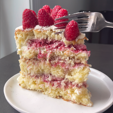 Coconut Cake with Raspberry Filling and Mascarpone Whipped Cream